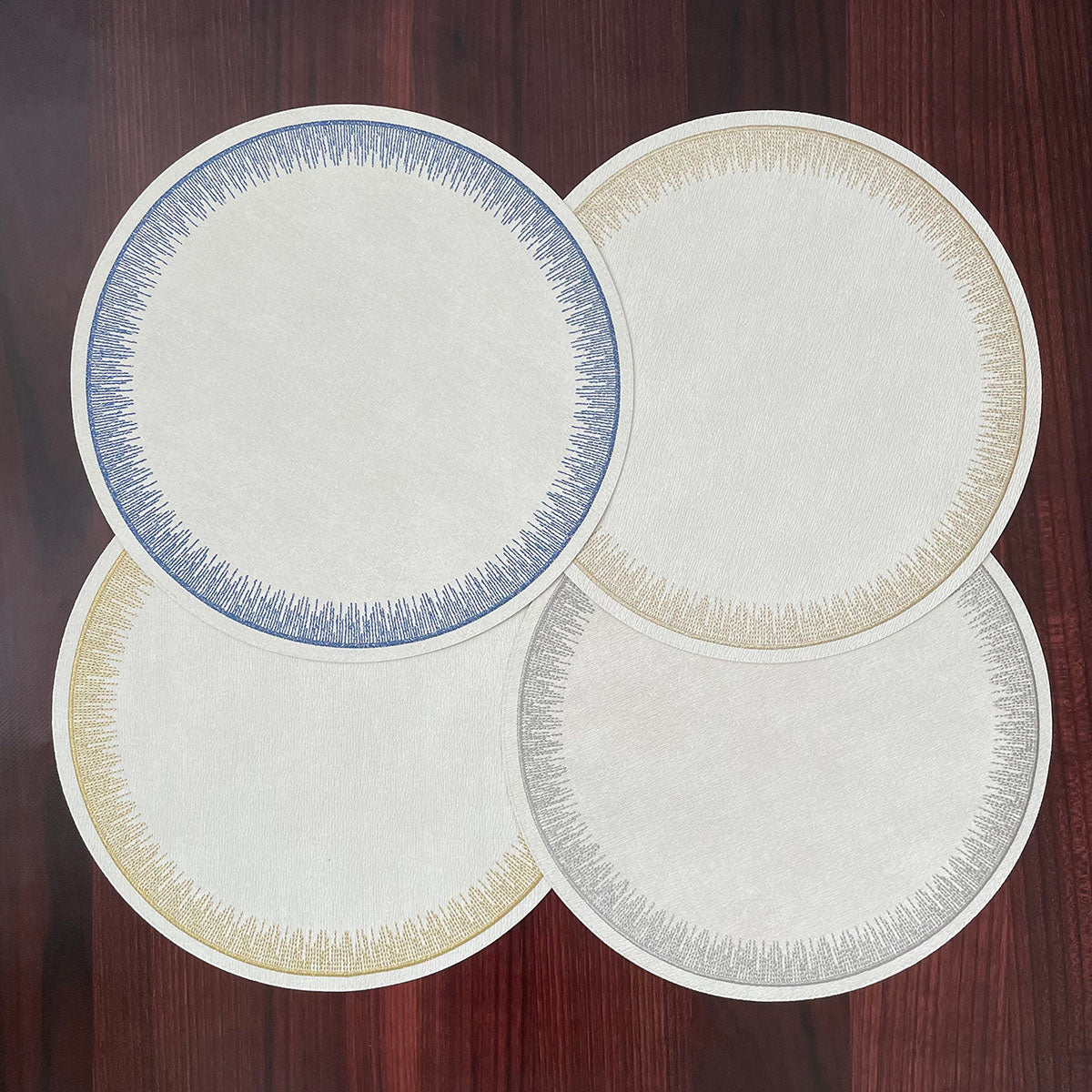 Flare Embroidered Round Placemats