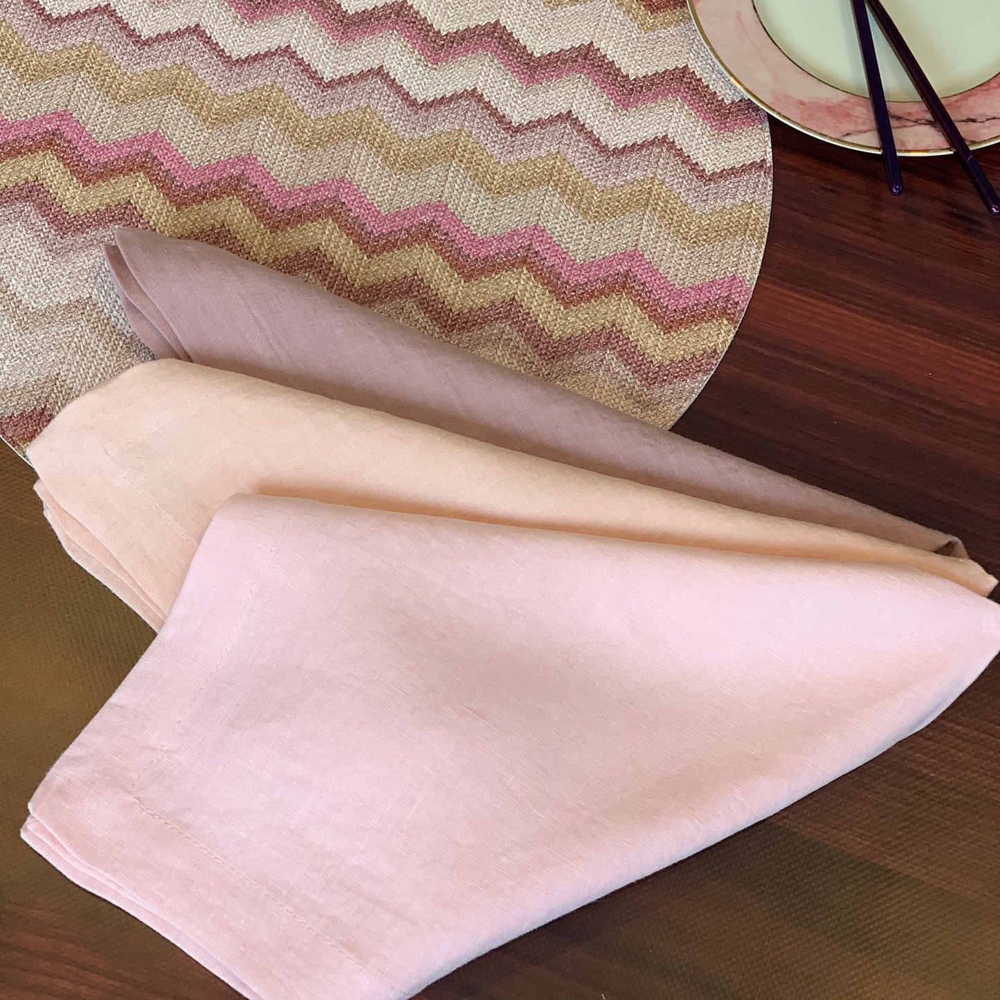 Soft stonewashed linen napkins in pink and mauve colors, no ironing