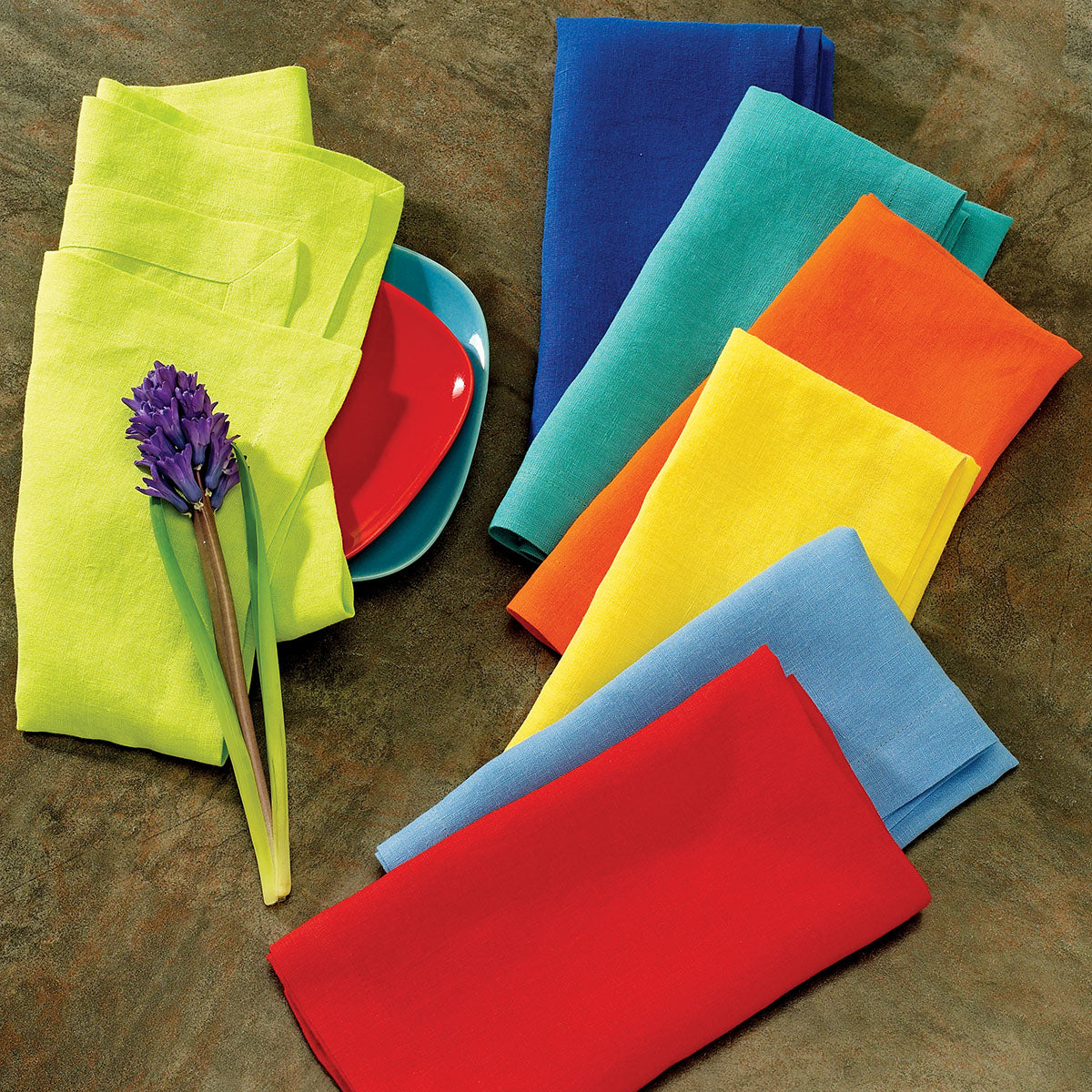Colorful solid stonewashed linen napkins, vibrant colors like tangerine, tomato and stunning indigo.