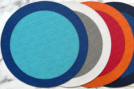 Colorful reversible vinyl placemats, luxurious and affordable